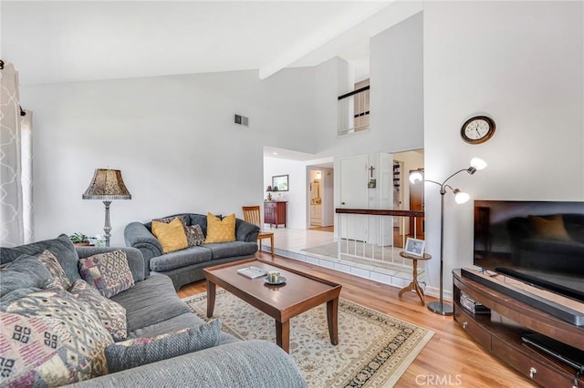 1358 Oakhurst Ct, Camarillo, CA 93010 - living room featuring light wood-type flooring and high vaulted ceiling