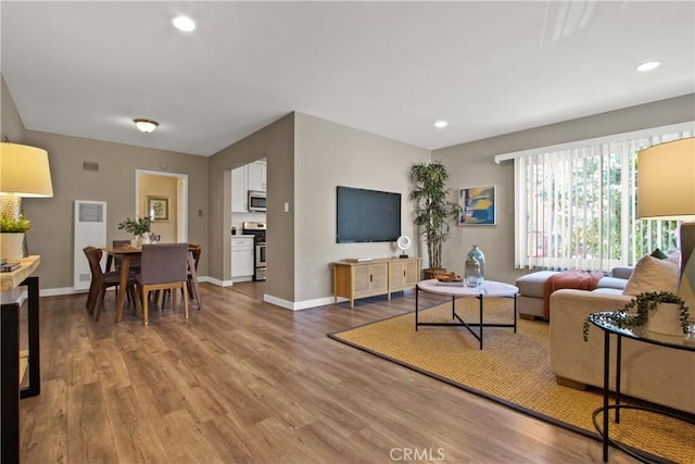 1327 E Appleton St Unit 1, Long Beach, CA 90802 - living area with wood finished floors and recessed lighting