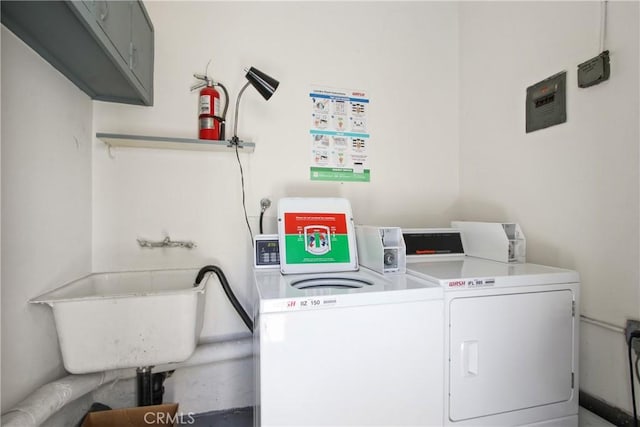 1327 E Appleton St Unit 1, Long Beach, CA 90802 - laundry area featuring washing machine and dryer and cabinet space