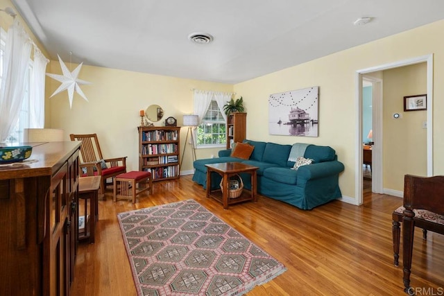 4886 Twain Ave, San Diego, CA 92120 - living room featuring light wood finished floors and baseboards