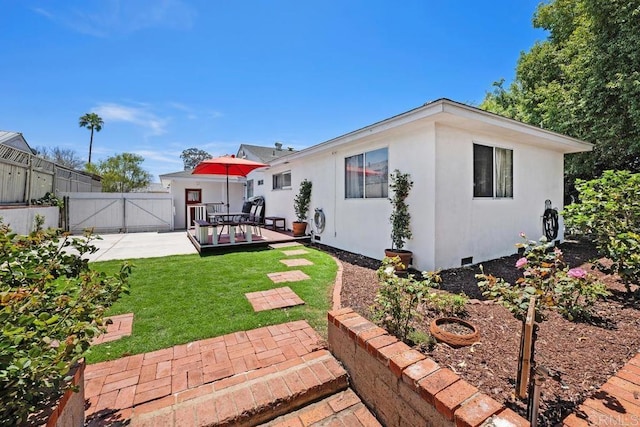 4886 Twain Ave, San Diego, CA 92120 - back of property with a patio, a gate, stucco siding, and crawl space