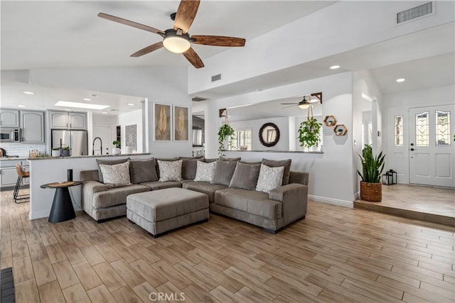 32175 Cedarcroft Rd, Acton, CA 93510 - living room featuring ceiling fan, vaulted ceiling, light wood finished floors, and recessed lighting
