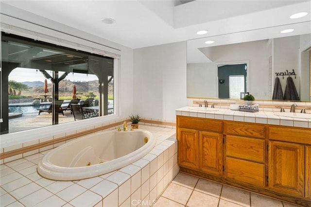 32175 Cedarcroft Rd, Acton, CA 93510 - bathroom featuring double vanity, a whirlpool tub, tile patterned flooring, and recessed lighting