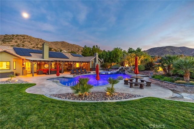 32175 Cedarcroft Rd, Acton, CA 93510 - pool at dusk with a lawn, a patio, a mountain view, and an outdoor pool