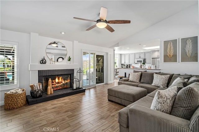 32175 Cedarcroft Rd, Acton, CA 93510 - living room with a fireplace, vaulted ceiling, ceiling fan, light wood-style flooring, and recessed lighting