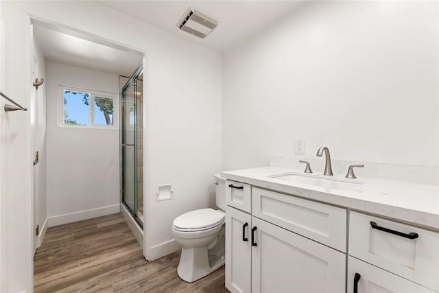 2038 Noble View Dr, Rancho Palos Verdes, CA 90275 - bathroom with vanity, a stall shower, and wood finished floors