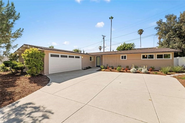 2038 Noble View Dr, Rancho Palos Verdes, CA 90275 - ranch-style house with concrete driveway, a garage, and stucco siding