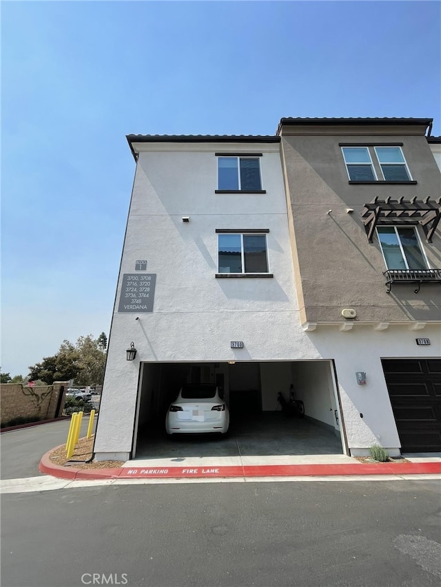 3700 Verdana Cir, La Verne, CA 91750 - view of front facade featuring stucco siding and an attached garage