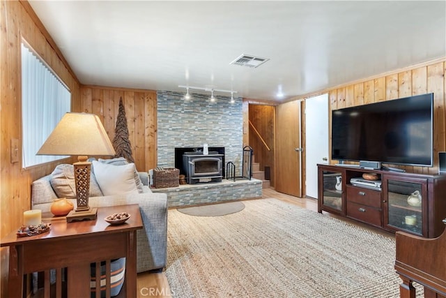 37667 Live Oak St, Angelus Oaks, CA 92305 - living area featuring wood walls, rail lighting, and a wood stove