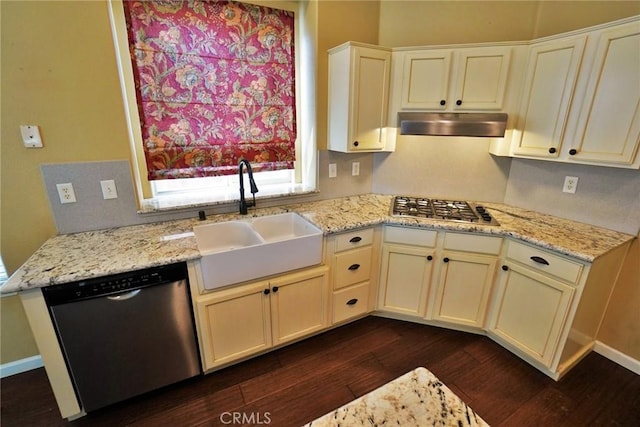 845 E Redwood Cir, Hanford, CA 93230 - kitchen featuring appliances with stainless steel finishes, under cabinet range hood, dark wood finished floors, and light stone counters