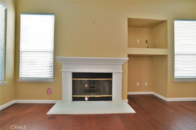 845 E Redwood Cir, Hanford, CA 93230 - detailed view of wood finished floors and a glass covered fireplace