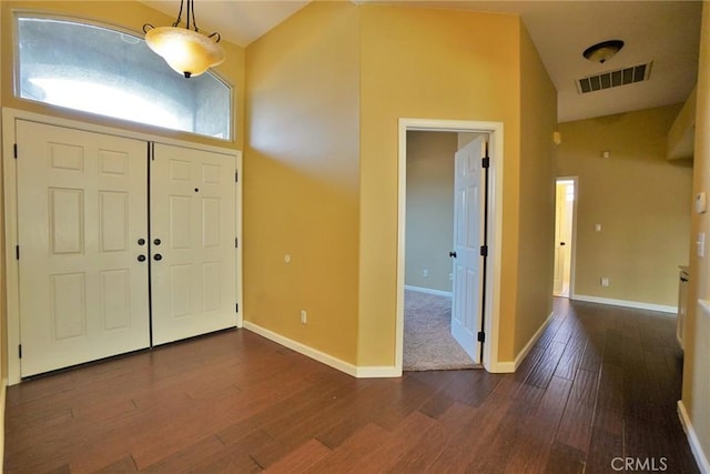 845 E Redwood Cir, Hanford, CA 93230 - foyer entrance with dark wood-style flooring and lofted ceiling