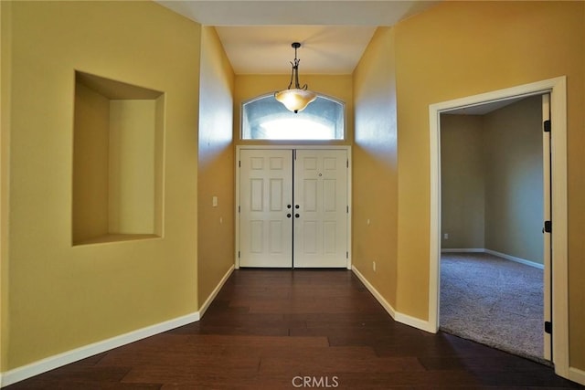 845 E Redwood Cir, Hanford, CA 93230 - foyer entrance with dark wood-type flooring and baseboards