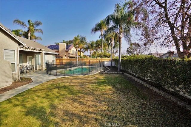 845 E Redwood Cir, Hanford, CA 93230 - fenced backyard featuring a patio area