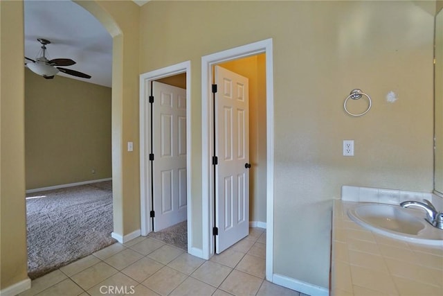 845 E Redwood Cir, Hanford, CA 93230 - bathroom with a ceiling fan, tile patterned flooring, and vanity