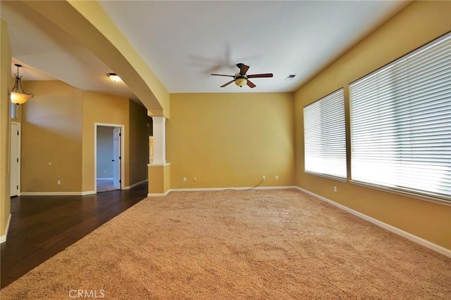 845 E Redwood Cir, Hanford, CA 93230 - carpeted spare room featuring ceiling fan and decorative columns