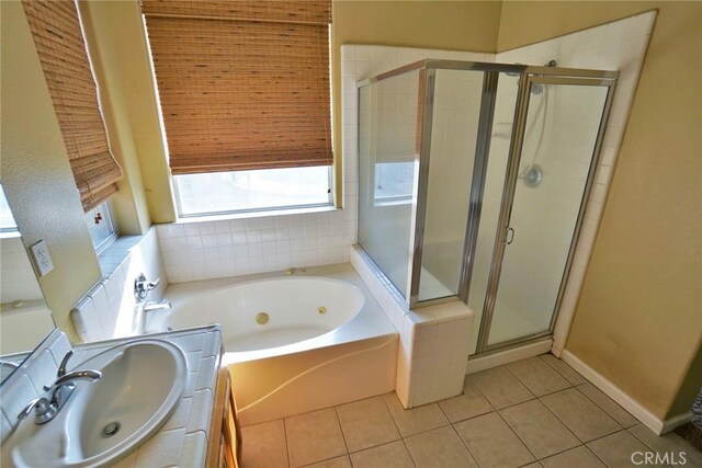 845 E Redwood Cir, Hanford, CA 93230 - bathroom featuring a whirlpool tub, a shower stall, tile patterned floors, and vanity