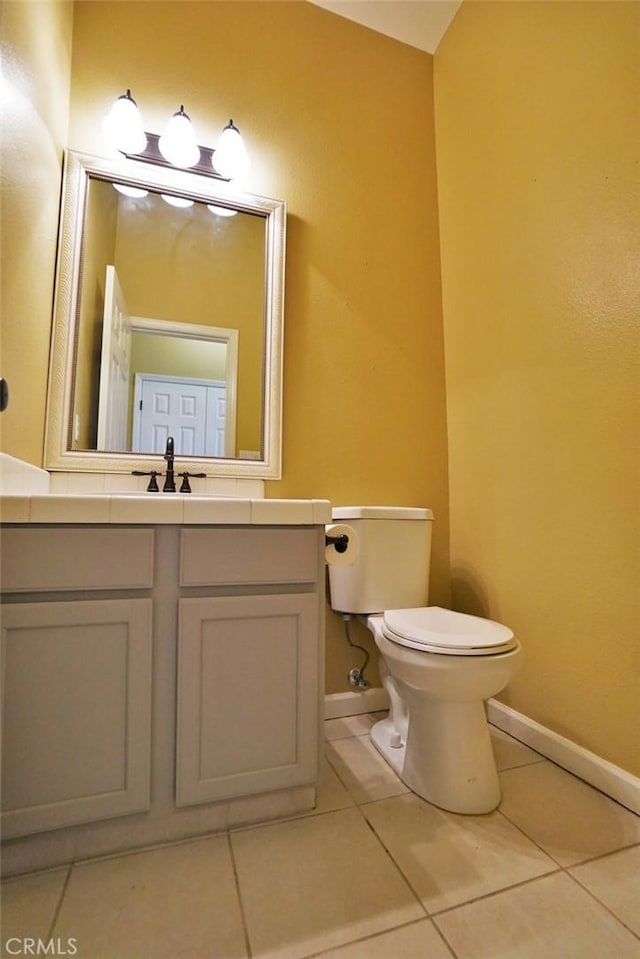 845 E Redwood Cir, Hanford, CA 93230 - half bathroom with tile patterned flooring and vanity