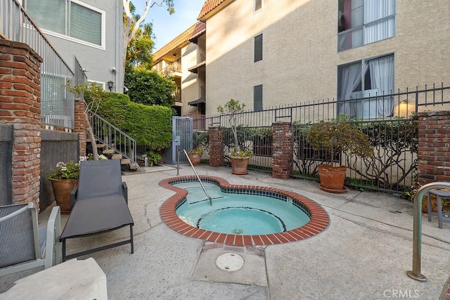 5870 Green Valley Cir Unit 231, Culver City, CA 90230 - view of pool featuring a community hot tub, stairs, and a patio