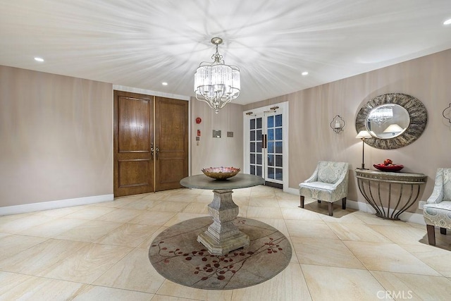 5870 Green Valley Cir Unit 231, Culver City, CA 90230 - entrance foyer with a chandelier, recessed lighting, and light tile patterned floors
