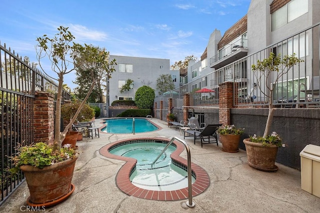 5870 Green Valley Cir Unit 231, Culver City, CA 90230 - community pool featuring a community hot tub and a patio