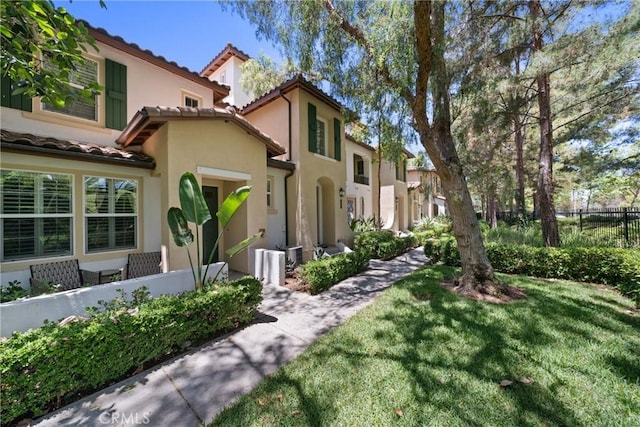 322 Dewdrop, Irvine, CA 92603 - mediterranean / spanish house featuring stucco siding and a tile roof