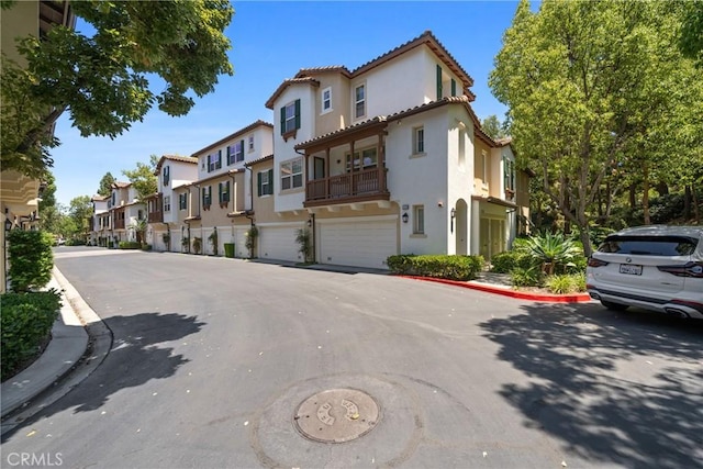 322 Dewdrop, Irvine, CA 92603 - view of asphalt road with a residential view and curbs