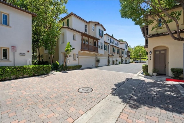 322 Dewdrop, Irvine, CA 92603 - view of decorative road featuring a residential view