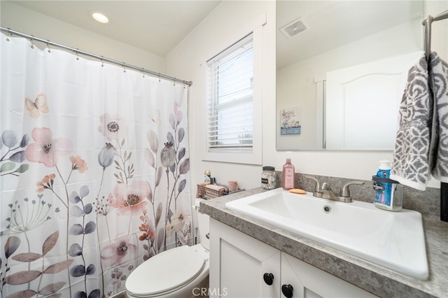 10147 Primrose Ave, Hesperia, CA 92345 - full bathroom featuring vanity, a shower with shower curtain, and recessed lighting