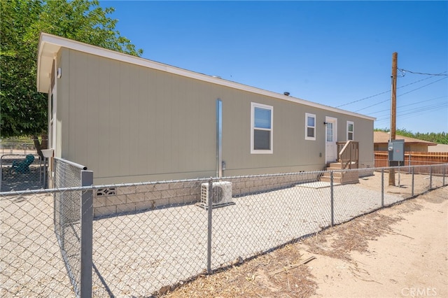 10147 Primrose Ave, Hesperia, CA 92345 - view of side of home featuring a cooling unit
