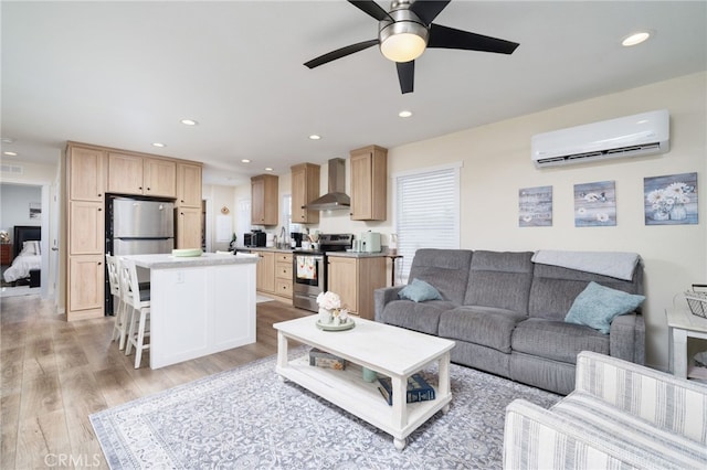 10147 Primrose Ave, Hesperia, CA 92345 - living area featuring an AC wall unit, light wood-style flooring, ceiling fan, and recessed lighting