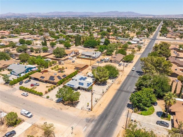 10147 Primrose Ave, Hesperia, CA 92345 - aerial perspective of suburban area featuring a mountainous background