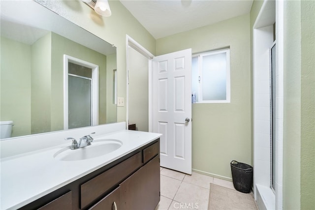 10147 Primrose Ave, Hesperia, CA 92345 - full bath featuring tile patterned floors, a shower stall, and vanity