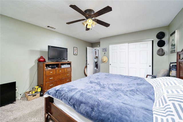 10147 Primrose Ave, Hesperia, CA 92345 - carpeted bedroom with a closet and a ceiling fan