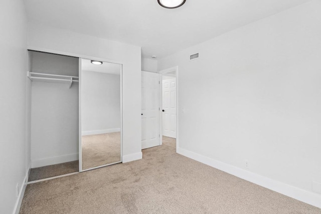 6876 Bear River Row Unit 3, San Diego, CA 92139 - unfurnished bedroom featuring carpet flooring and a closet