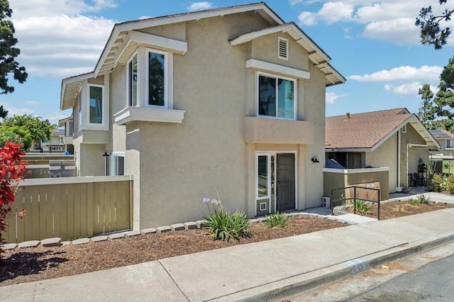6876 Bear River Row Unit 3, San Diego, CA 92139 - view of front of home featuring stucco siding