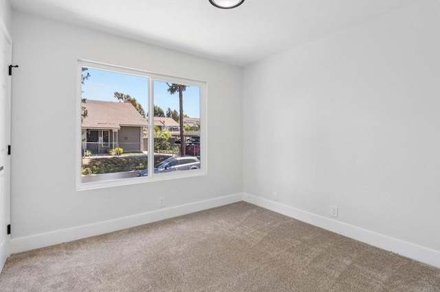 6876 Bear River Row Unit 3, San Diego, CA 92139 - carpeted spare room featuring baseboards