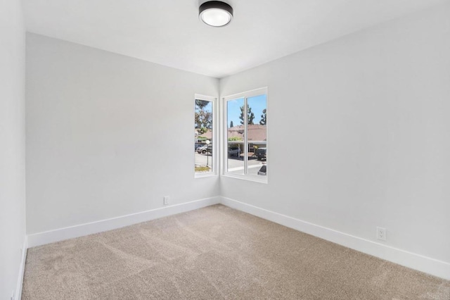 6876 Bear River Row Unit 3, San Diego, CA 92139 - empty room featuring light carpet and baseboards