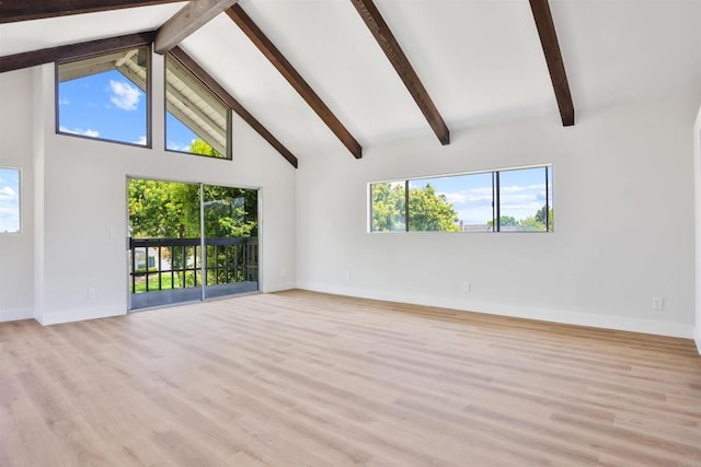 286 E Mission Rd, Corona, CA 92879 - unfurnished living room featuring beamed ceiling, high vaulted ceiling, and light wood finished floors