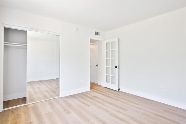 286 E Mission Rd, Corona, CA 92879 - unfurnished bedroom featuring wood finished floors and a closet