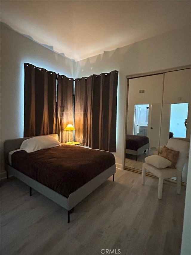 132 Sandpiper Ln, Aliso Viejo, CA 92656 - bedroom with light wood finished floors