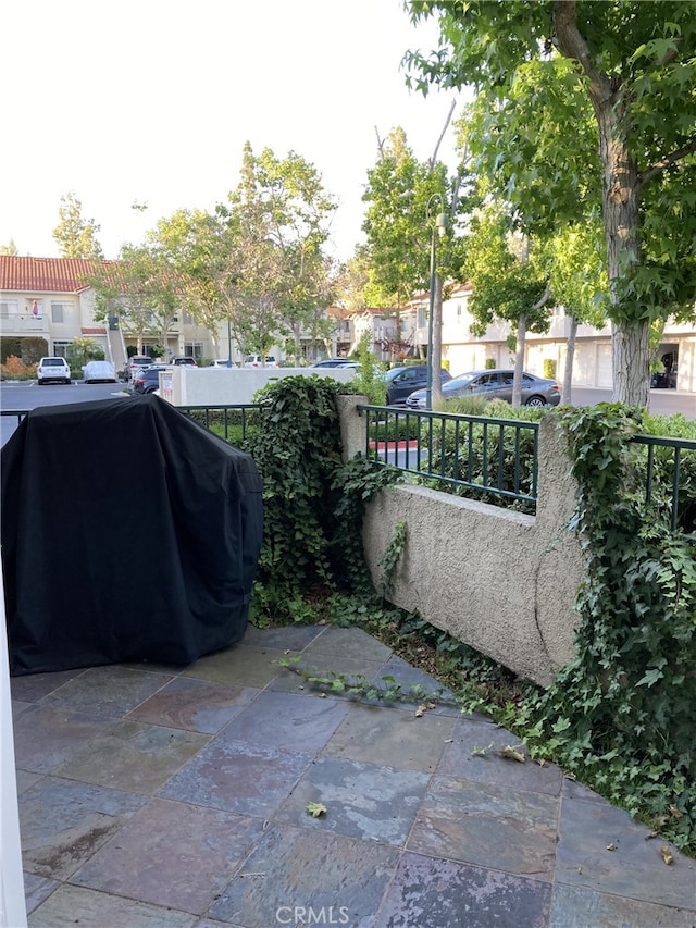 132 Sandpiper Ln, Aliso Viejo, CA 92656 - view of patio / terrace with grilling area and a residential view