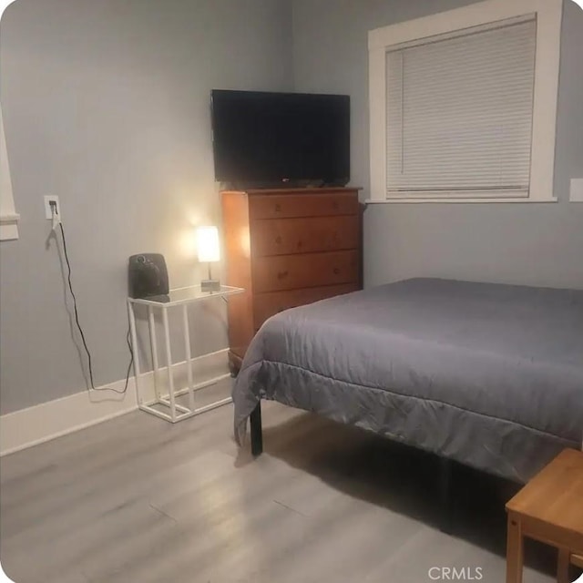 15943 L St, Mojave, CA 93501 - bedroom featuring wood finished floors and baseboards