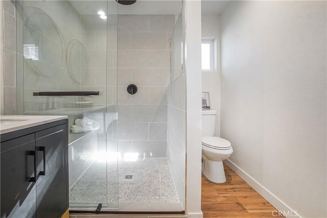 8283 Cornwall Ave, Rancho Cucamonga, CA 91739 - full bath with a tile shower, wood finished floors, and vanity