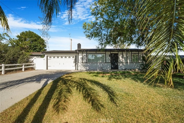8283 Cornwall Ave, Rancho Cucamonga, CA 91739 - ranch-style home with a garage, concrete driveway, and a chimney