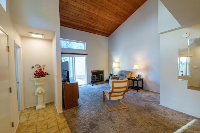 3833 Via Del Bardo, San Ysidro, CA 92173 - tiled living room featuring high vaulted ceiling, wooden ceiling, and carpet flooring