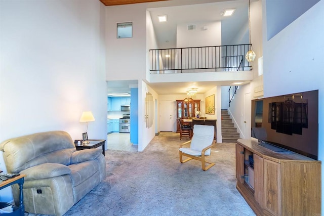 3833 Via Del Bardo, San Ysidro, CA 92173 - living area featuring stairs, carpet, and a high ceiling