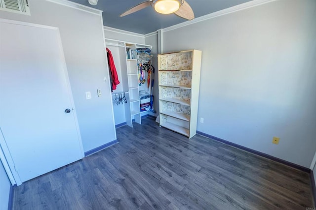 3833 Via Del Bardo, San Ysidro, CA 92173 - unfurnished bedroom with dark wood-style floors, a closet, ceiling fan, and ornamental molding