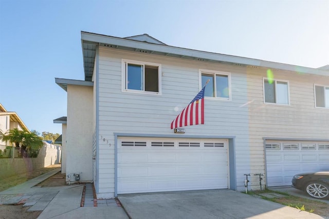 3833 Via Del Bardo, San Ysidro, CA 92173 - view of front facade with a garage and driveway