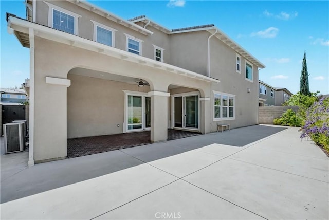54 Sagan Way, Irvine, CA 92618 - back of house featuring stucco siding, a patio, and a ceiling fan